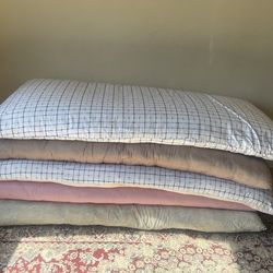 Five mattress and six pillows