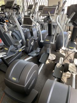 Technogym Commercial Elliptical With Moving Arms, In Like New Condition. 