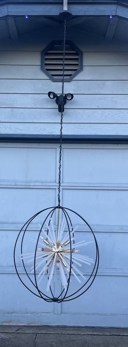 9’ Chandelier spring cleaning out