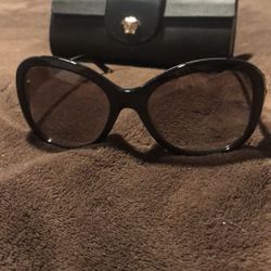 Women’s Versace sunglasses with case
