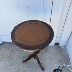 Round solid wood side table