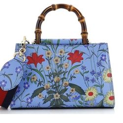 Gucci
Nymphaea Top Handle Bag Floral Printed Leather Mini