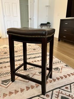 Leather and studded stool