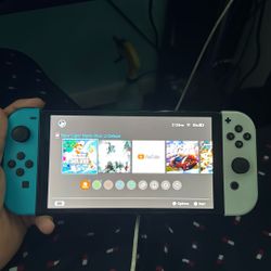 Nintendo Switch OLED + Games & Accessories