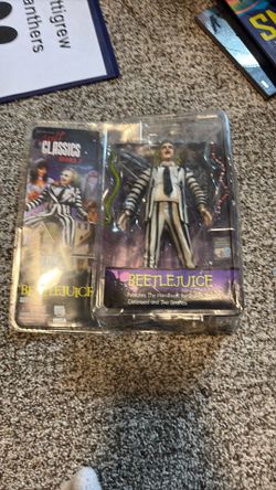 Beetle juice doll and 2 snakes