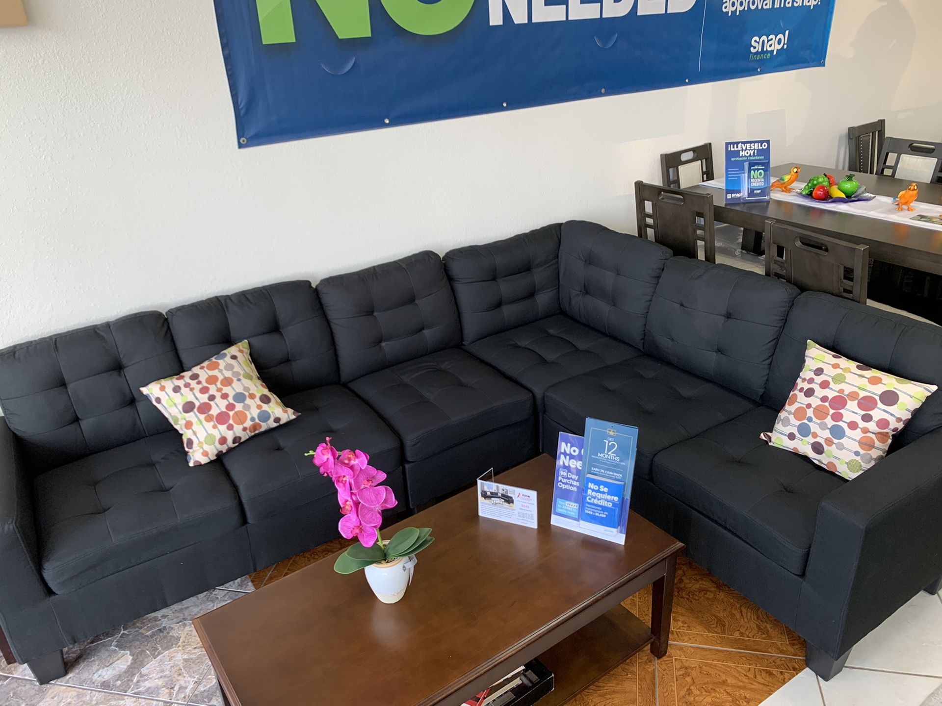 Black sectional couch was $899 now $599