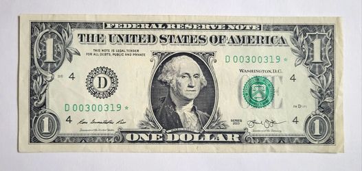 Series 2013 United States one-dollar bill featuring a Star Note serial number