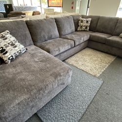 Ashley gray Sectional New Last One Was $1999 Now 25% Off $1599 Delivered. 