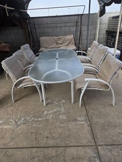 6 chairs patio table and 6 cushions.
