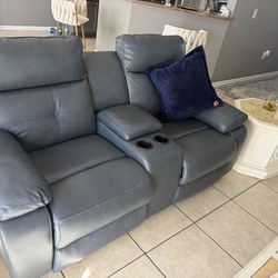 Sofa and loveseat, recliners, leather great condition practically like new