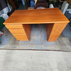 Teak desk, with drawers and shelves
