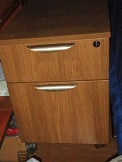 mobile mehagony 2-drawer pedestal filing cabinet. I have 2 of them
