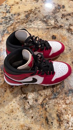 Used in good condition red and white Nike air Jordan cleats youth size 5y