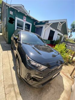 Black Toyota RAV4 SUV LE