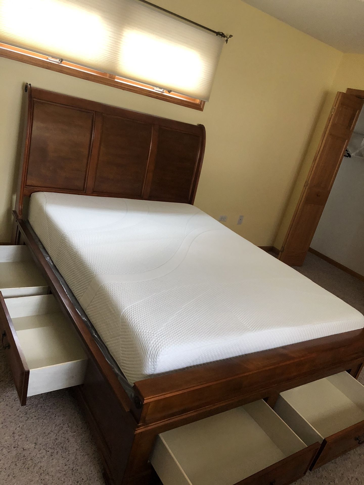 Queen bed frame and mattress with drawers in excellent conditions memory foam