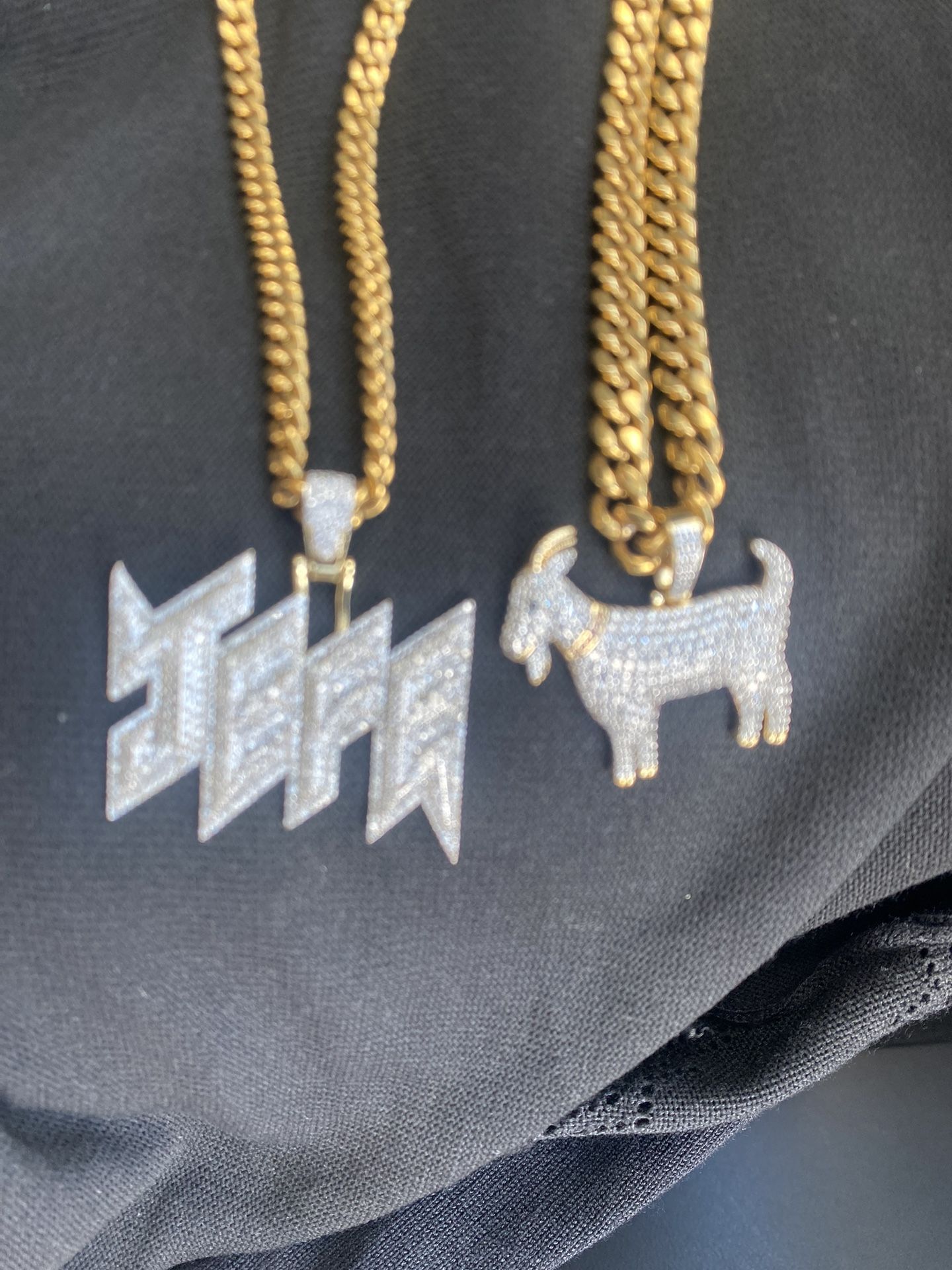 Two Gold Chains With Pendant