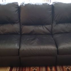 Black leather reclining sofa