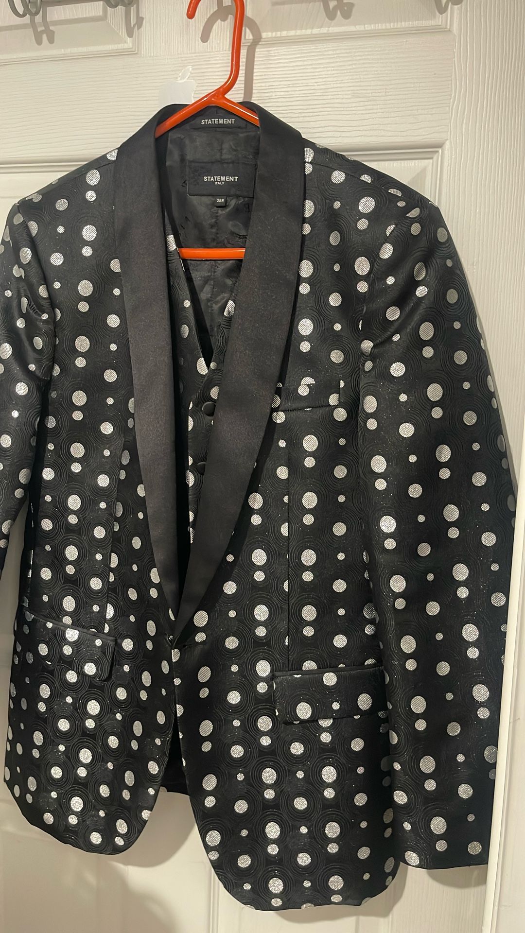 Black and silver men’s jacket and vest