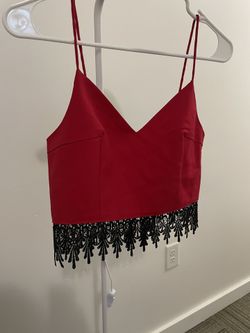 Purchased at a boutique. Never worn. Size M.
