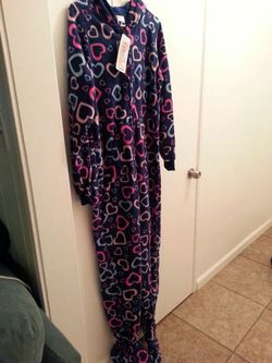 New footed pijamas,size M