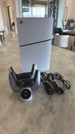 Playstation 5 digital edition with 2 controllers and a charging dock