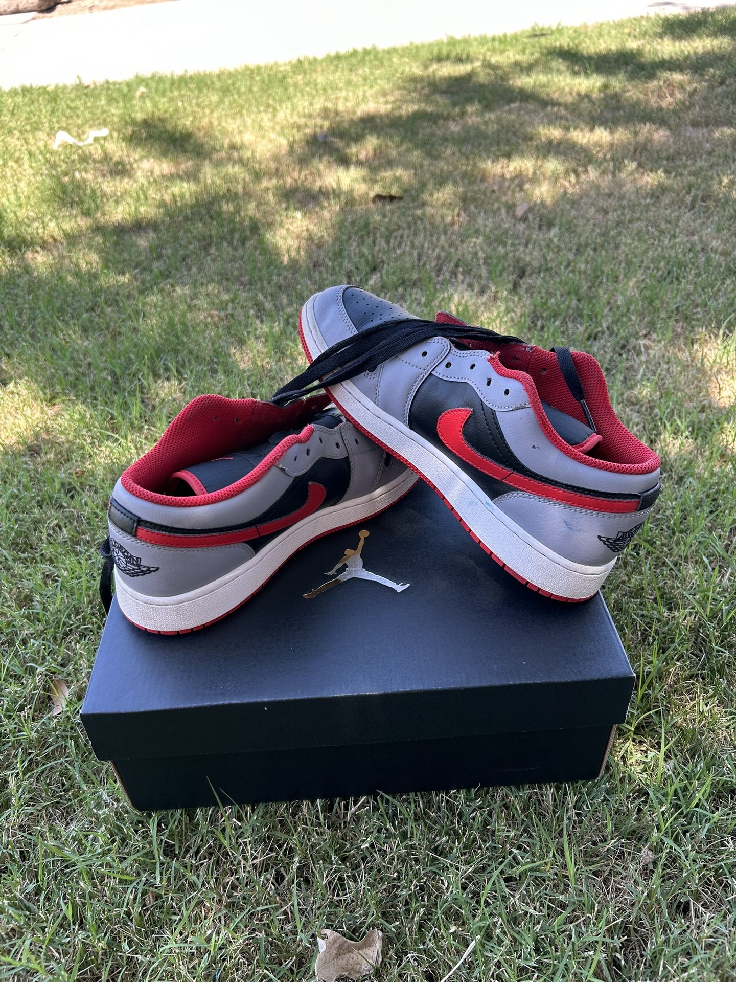 Jordan 1 Low Red, Grey, And Black With Two Golf Balls
