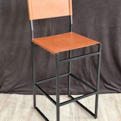 pottery barn/williams sonoma lamb skin leather & black iron chairs 