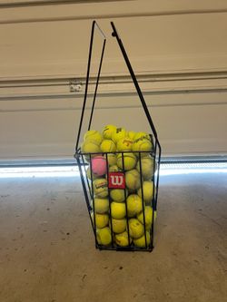 Tennis ball and hopper