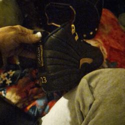  Jordan 12 Retro Black Taxi sneakers. 