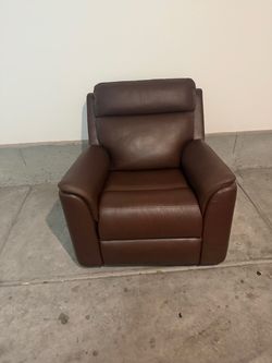 Brown leather rocker recliner