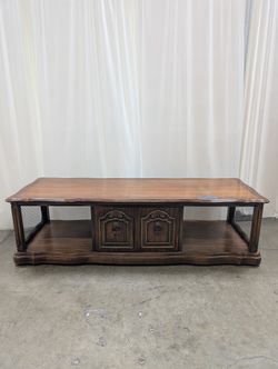 Traditional Dark Wood Coffee Table with Ornate Hardware