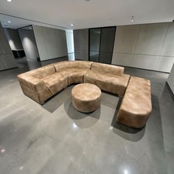 Desing  Curved Cognac Sectional Sofa with Round Ottoman