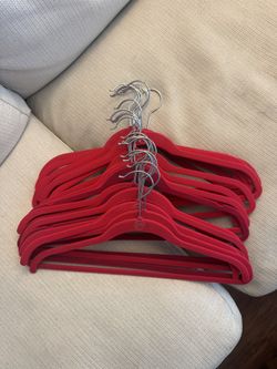25 pink velvet hangers 