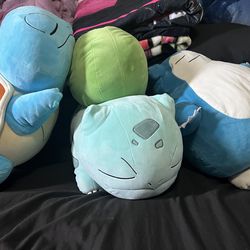 Sleeping Pokémon plushies