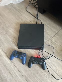 PlayStation 4 with 2 controllers