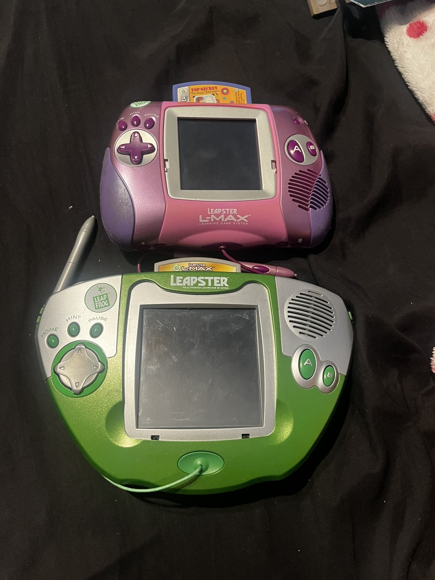 leapfrog leapster consoles with a bunch of learning games
