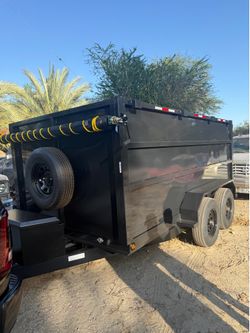 2027 smooth wall dump trailer 12 ft!