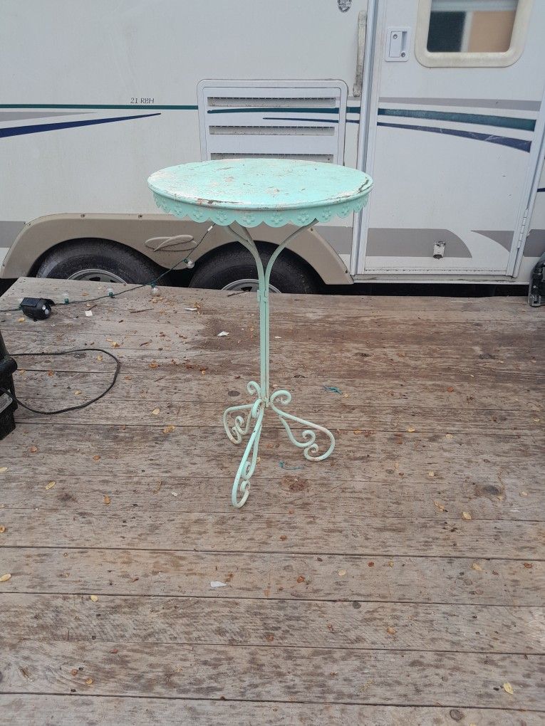 Vintage Solid Metal side table. Needs paint job
