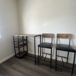 Wine/ outdoor table with two high chairs