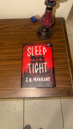 Sleep tight: a novel by J.H. Markert
