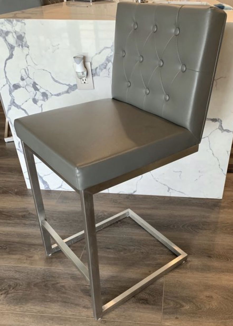 4 Gray faux leather counter height stools