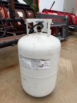 Steel 30-lb Empty Propane Tank.  Half full or better
