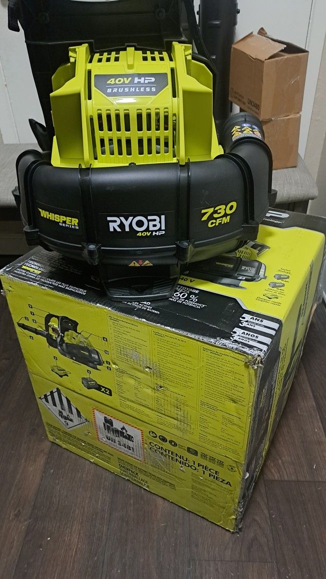 RYOBI40V HP Brushless Whisper Series 165 MPH 730 CFM Cordless Battery Backpack Blower with (2) 6.0 Ah Batteries and Charger