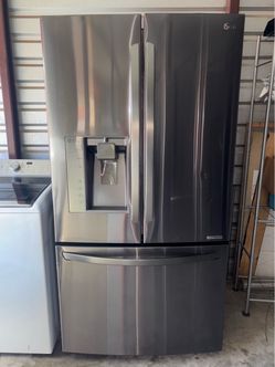 LG Dark Stainless Steel Refrigerator And Freezer