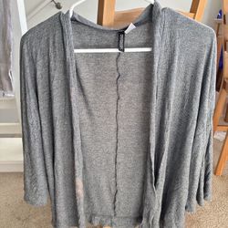 H&M Divided Gray Open Front 3/4 Sleeve Cardigan Sweater Size Medium  Has dyed area after washed with white shirt. See photo for dyed area  Comes from 