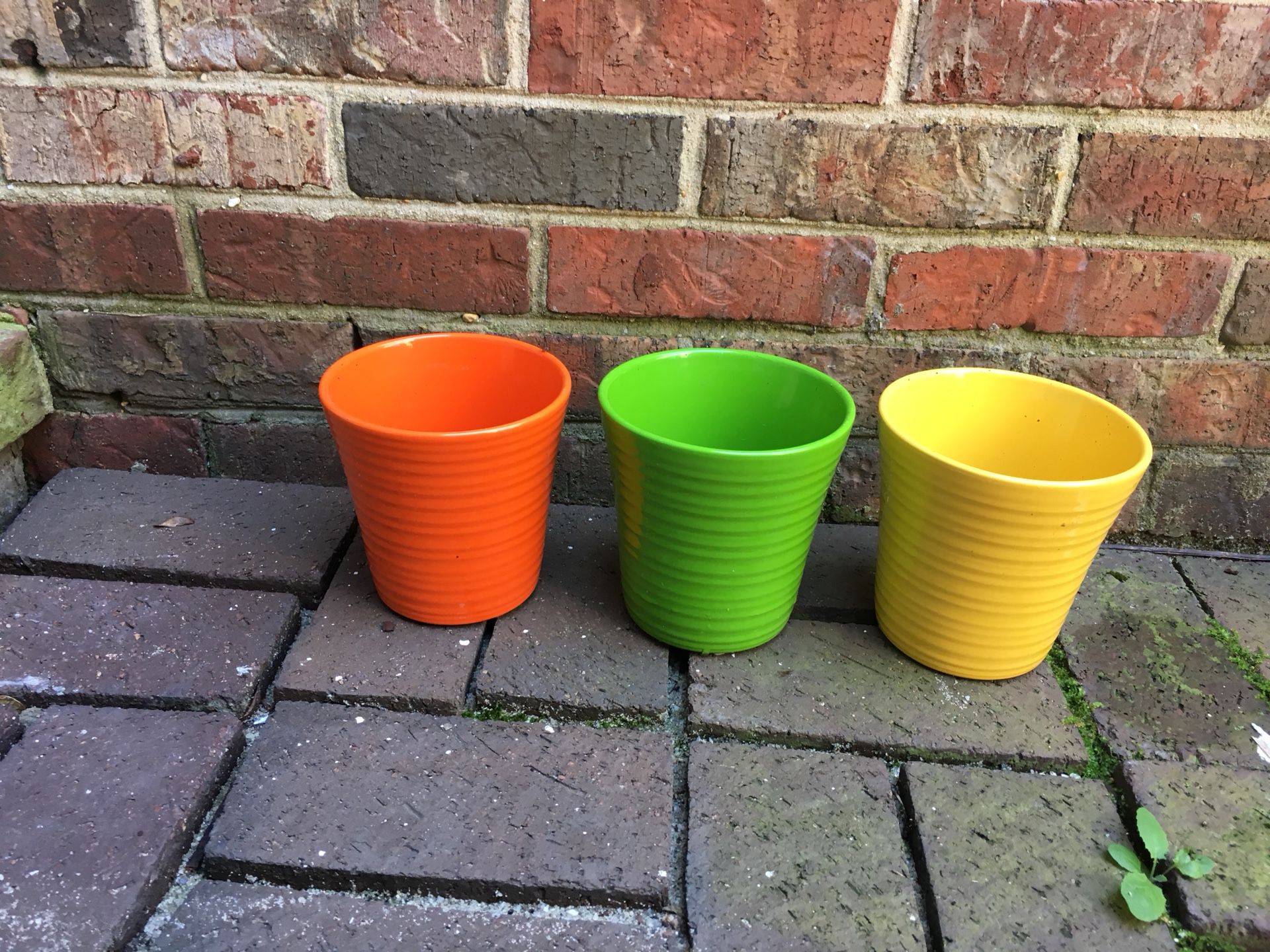 Vibrant colored small ceramic flower pots