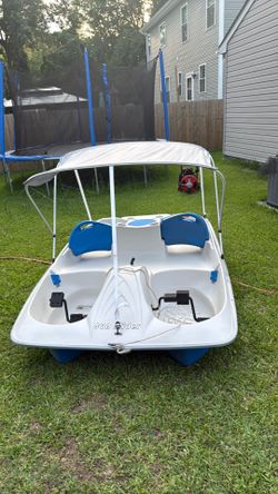 Dolphin 4 person Paddle Boat. $400 or best offer. Paid $599
