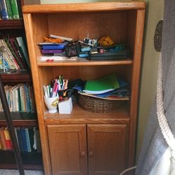 Shelf with storage cabinet