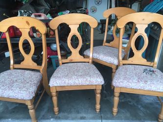 4 WOODEN CHAIRS NEED RECOVERED~SEE PIC PUPPY CHEW AREA~SOLD AS IS