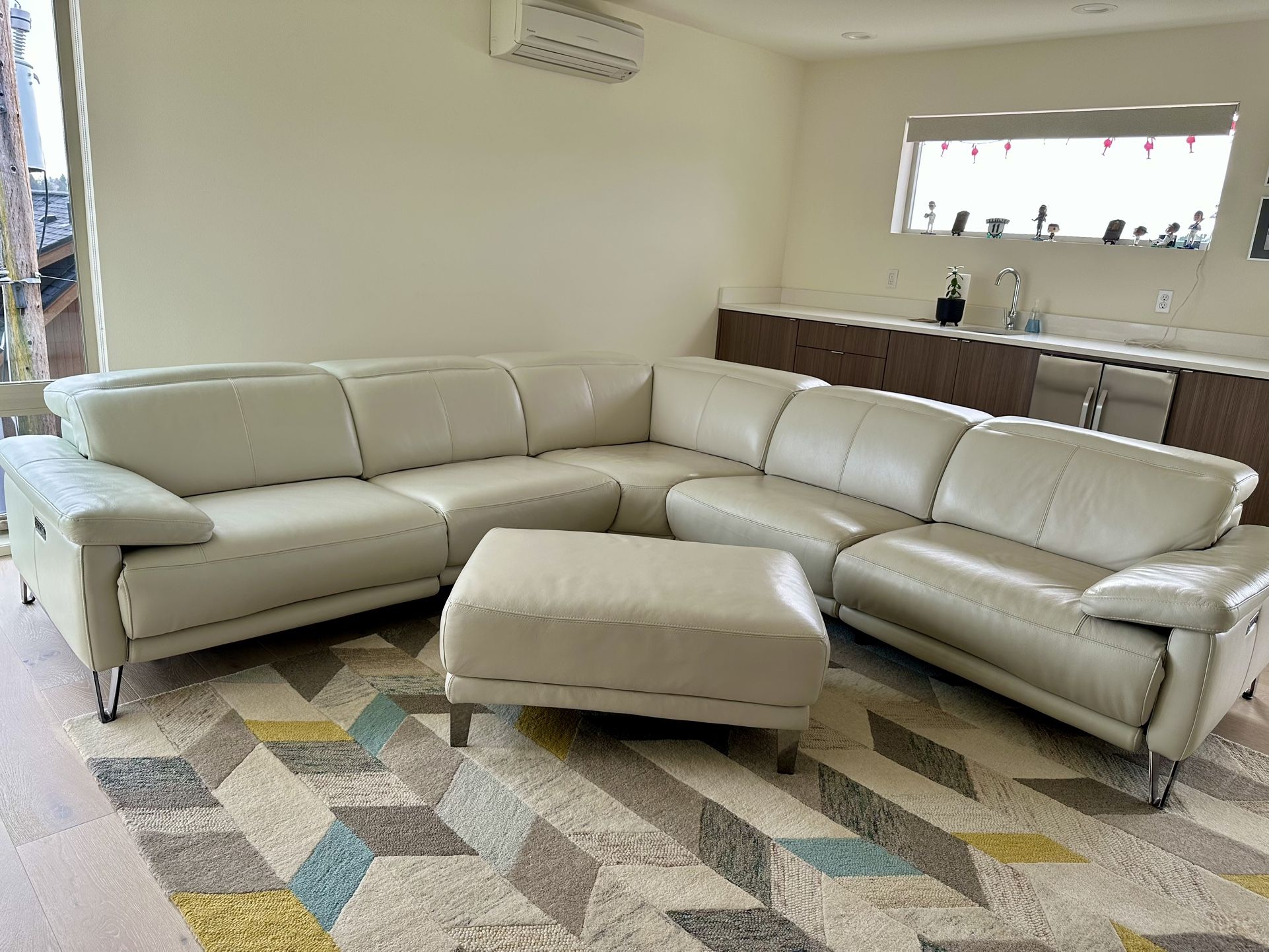 Dania White Leather Power Reclining Sectional And Ottoman